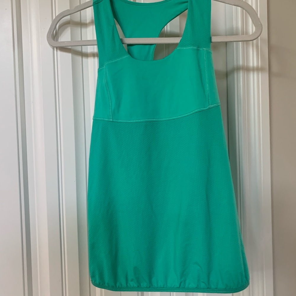 Size 14 girls Ivivva tank top with shelf bra